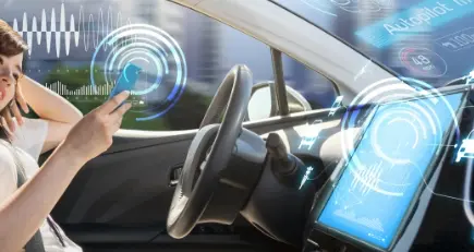 A woman in a car that drives autonomous
