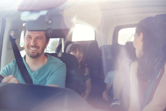 A family driving in a car